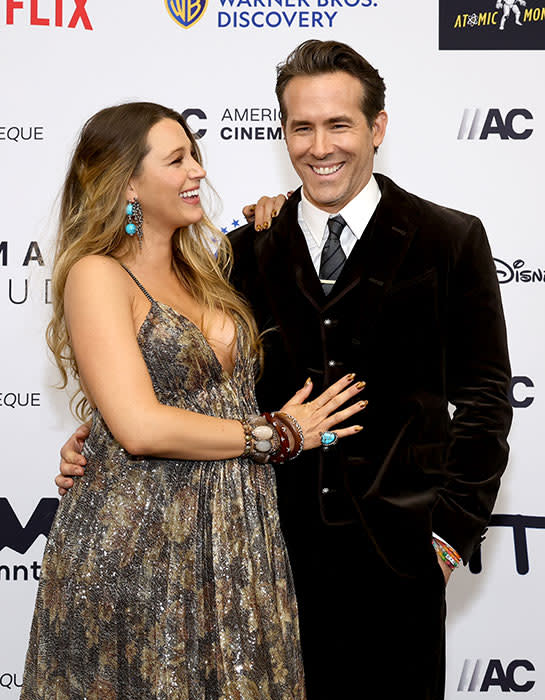 A pregnant Blake Lively on the red carpet with her husband Ryan Reynolds