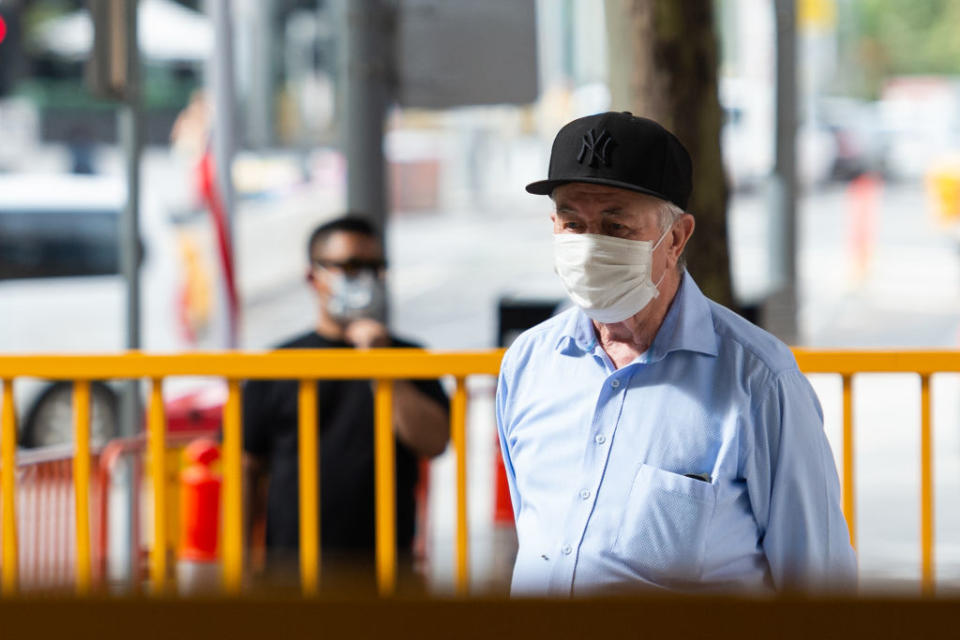 An elderly man wears a mask in Melbourne. Source: Getty