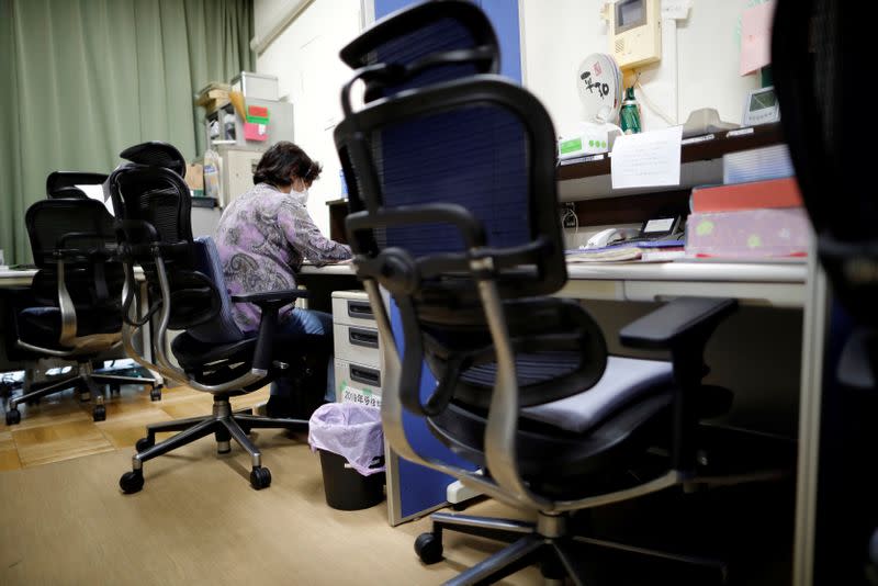 A volunteer handles an incoming call at the Tokyo Befrienders call center, a Tokyo's suicide hotline center, during the spread of the coronavirus disease (COVID-19), in Tokyo