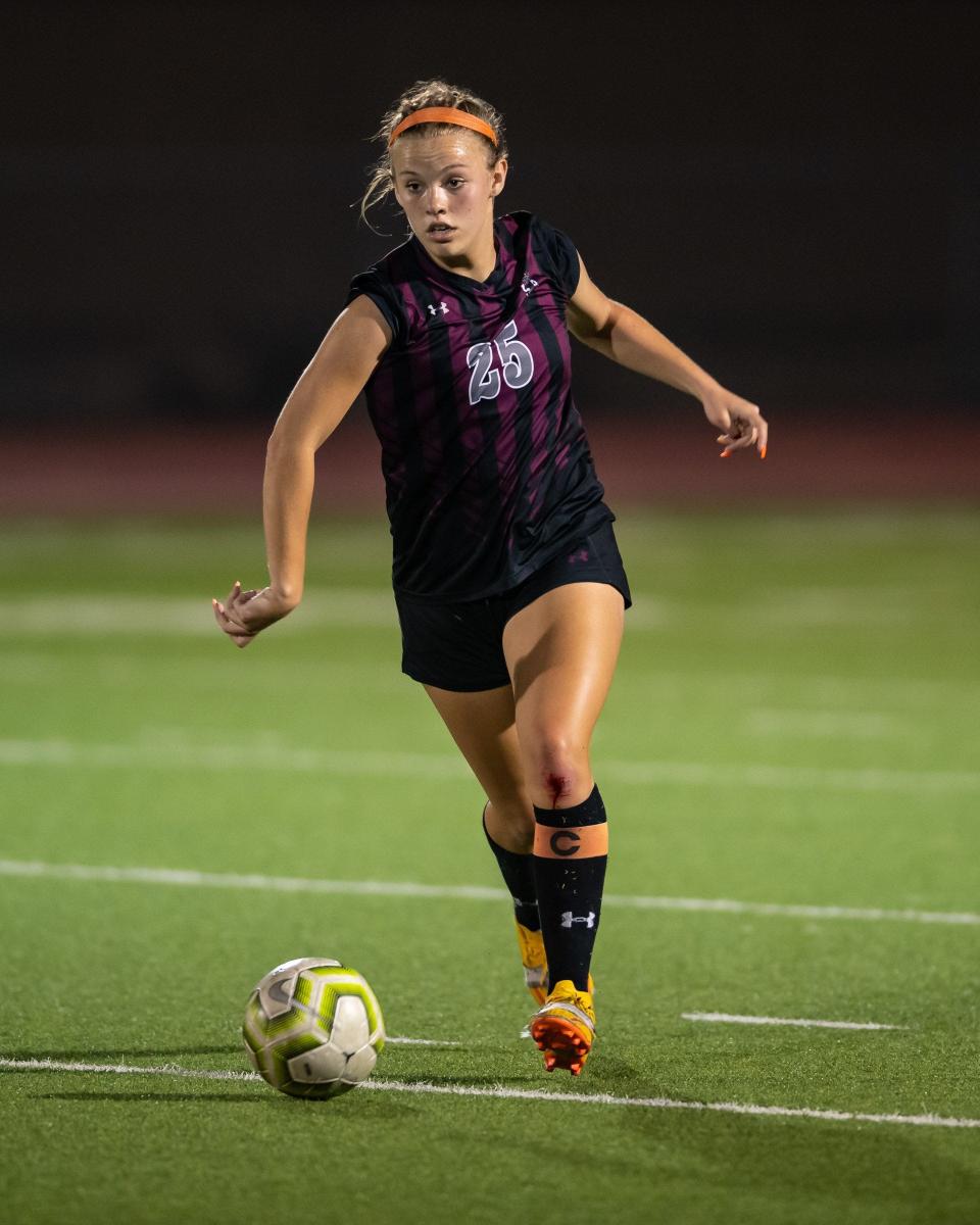 AJ Mayock brings the ball up the field for Round Rock during a match last season. Round Rock won a district girls soccer match over Vandegrift, 4-3 in penalty kicks after a 0-0 tie in regulation, at Round Rock on February 28, 2023.