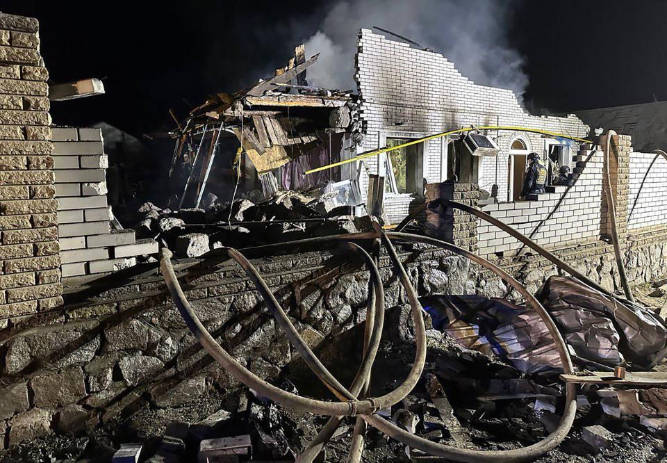 This handout picture taken and released by Ukrainian Presidential Chief of Staff, Andriy Yermak shows a destroyed house after a strike in the city of Zaporizhzhia (AFP/Getty)