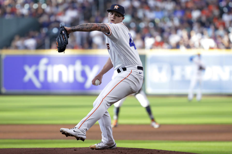 Houston Astros starter Hunter Brown winds up during the first inning of the team's baseball game against the Texas Rangers on Saturday, April 15, 2023, in Houston. (AP Photo/Michael Wyke)