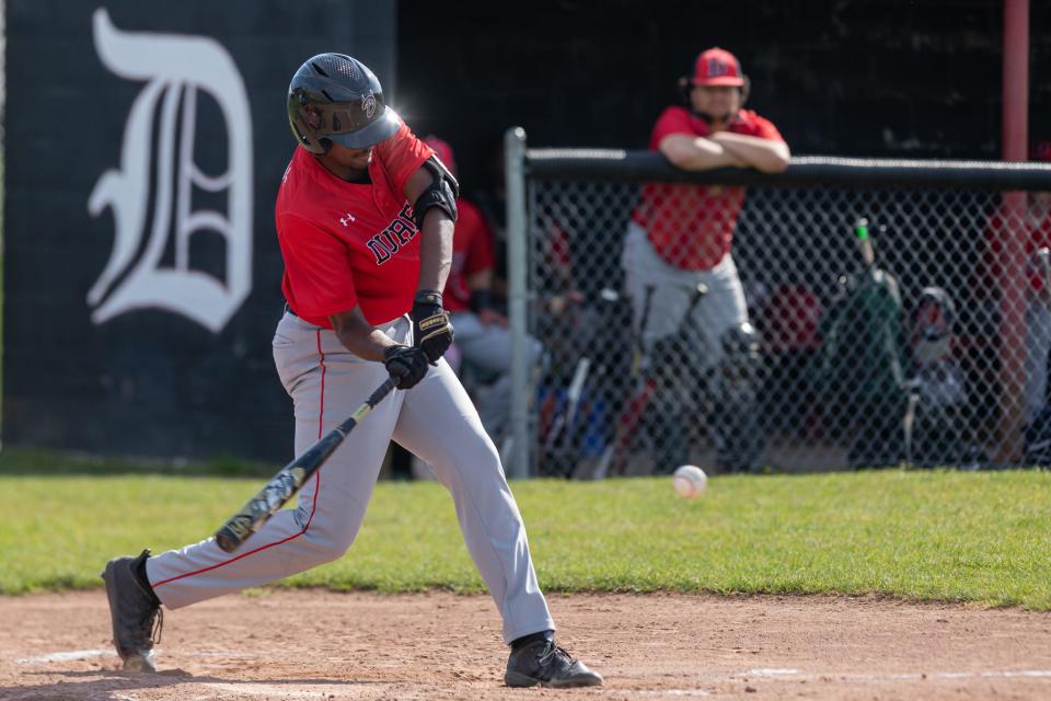 Durfee’s Alexis Montilla puts a swing on a pitch for an RBI hit on Monday against New Bedford. 