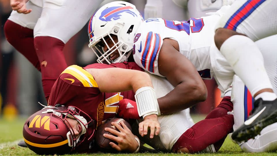 Buffalo Bills defensive end Greg Rousseau sacks Washington Commanders quarterback Sam Howell. - Evan Vucci/AP