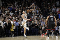 <p>San Antonio Spurs’ Manu Ginobili (20) of Argentina blocks Houston Rockets’ James Harden three-point shot attempt in the final seconds of overtime of Game 5 in a second-round NBA basketball playoff series, May 9, 2017, in San Antonio. San Antonio won 110-107. (Photo: Eric Gay/AP) </p>