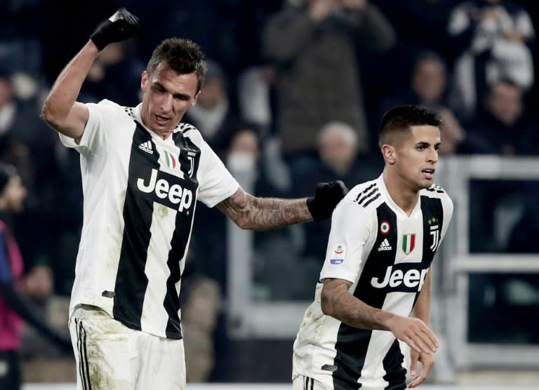 Juventus' Croatian forward Mario Mandzukic (L) scored his seventh league goal this season