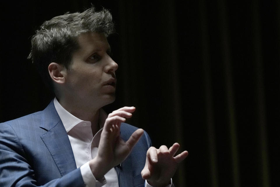 OpenAI's CEO Sam Altman, the founder of ChatGPT and creator of OpenAI gestures while speaking at University College London, as part of his world tour of speaking engagements in London, Wednesday, May 24, 2023.(AP Photo/Alastair Grant)