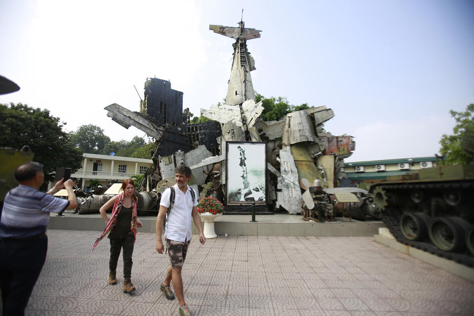 In this Feb. 21, 2019, photo, tourists visit Vietnam Military History Museum in Hanoi, Vietnam. The Vietnamese capital once trembled as waves of American bombers unleashed their payloads, but when Kim Jong Un arrives here for his summit with President Donald Trump he won’t find rancor toward a former enemy. Instead, the North Korean leader will get a glimpse at the potential rewards of reconciliation. (AP Photo/Hau Dinh)