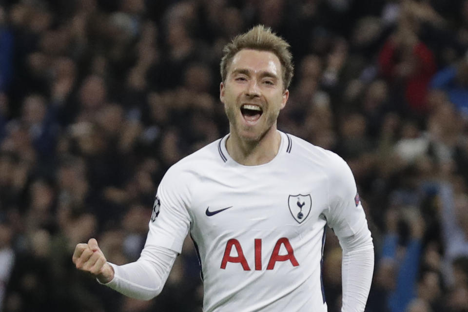 Tottenham’s Christian Eriksen celebrates scoring his side’s third goal during a Champions League Group H soccer match between Tottenham Hotspur and Real Madrid at the Wembley stadium in London.