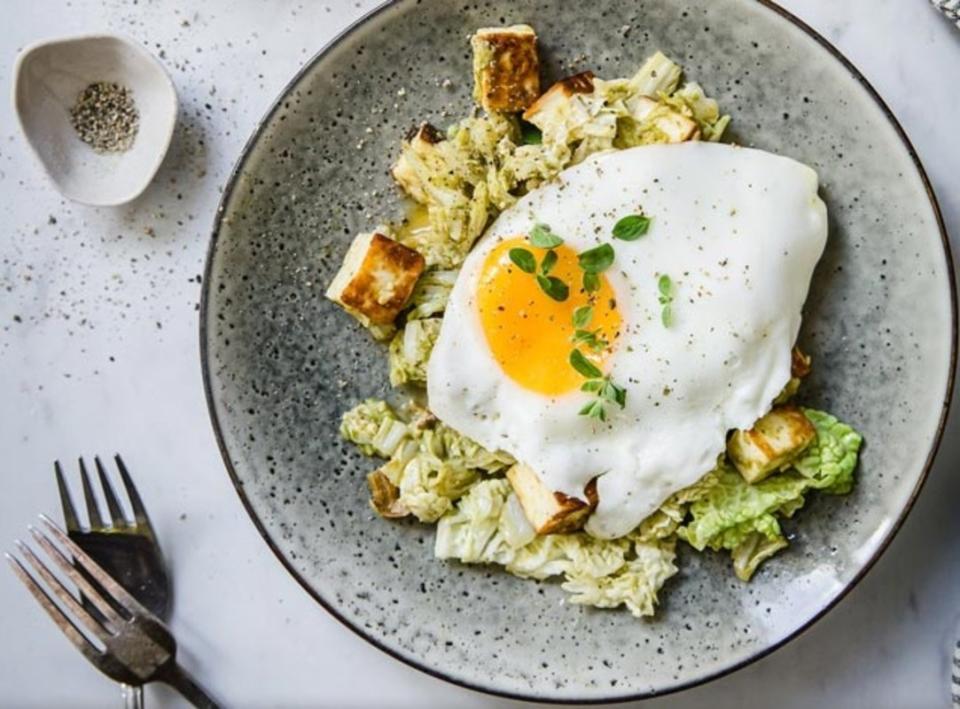 <p>Keto Diet App</p><p>Cabbage halloumi and pesto breakfast hash will be your next go-to keto breakfast dish. Stir-fried cabbage is mixed with halloumi and pesto and topped with a fried egg.</p><p><strong>Get the recipe: <a href="https://ketodietapp.com/Blog/lchf/cabbage-halloumi-and-pesto-breakfast-hash" rel="nofollow noopener" target="_blank" data-ylk="slk:Cabbage, Halloumi and Pesto Breakfast Hash;elm:context_link;itc:0;sec:content-canvas" class="link ">Cabbage, Halloumi and Pesto Breakfast Hash </a></strong></p>