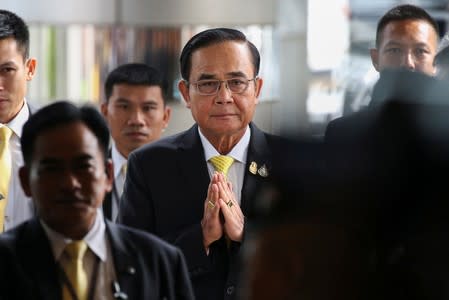 Thailand's Prime Minister Prayuth Chan-ocha arrives before delivering the policy statement of the council of ministers, at the parliament in Bangkok