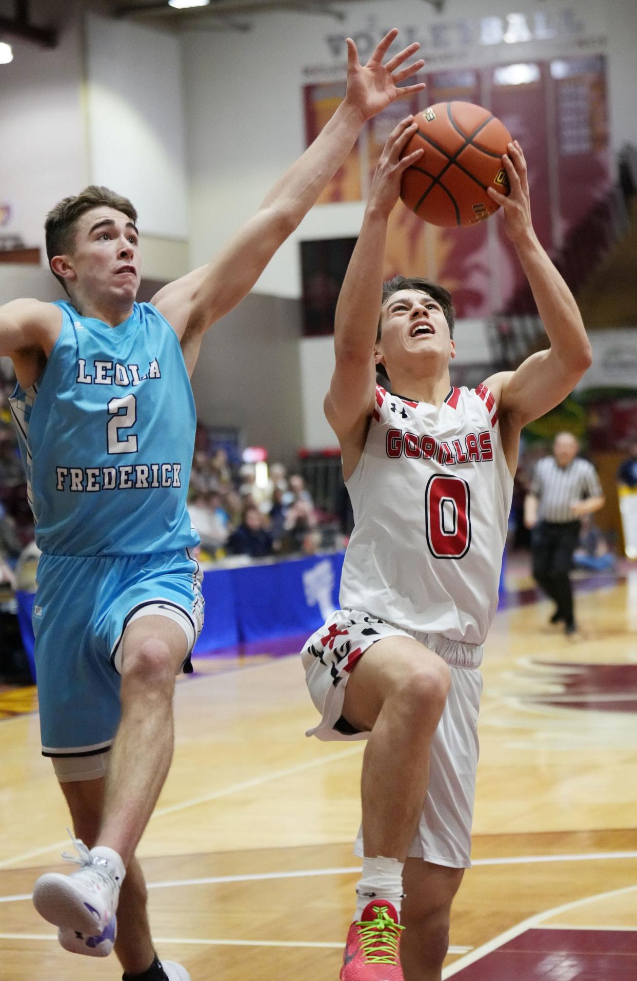 Gregory's Noah Bearshield goes up for a shot against Leola-Frederick Area's Brayden Sumption during their consolation semifinal game in the state Class B boys basketball tournament on Friday, March 15, 2024 in the Barnett Center at Aberdeen, Gregory won 65-64.