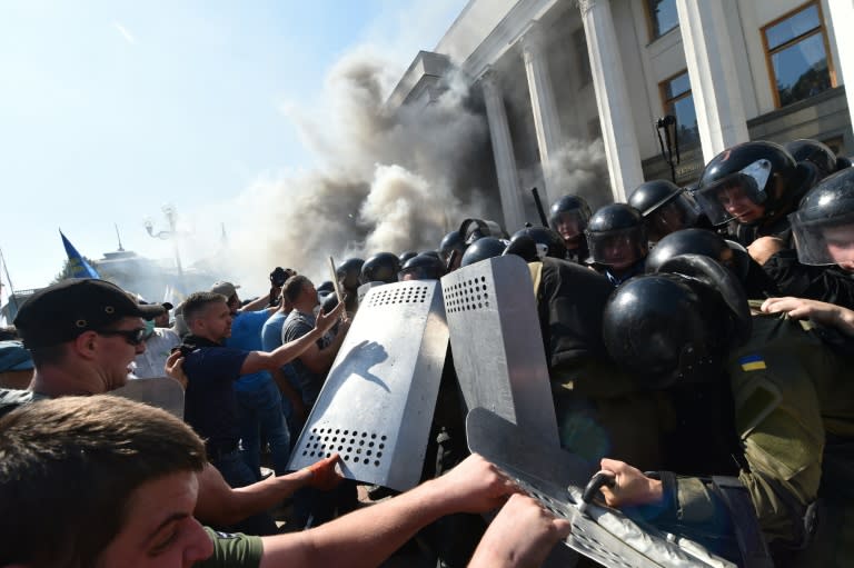 Activists of radical Ukrainian parties, including the nationalist party Svoboda (Freedom), clash with police on August 31, 2015