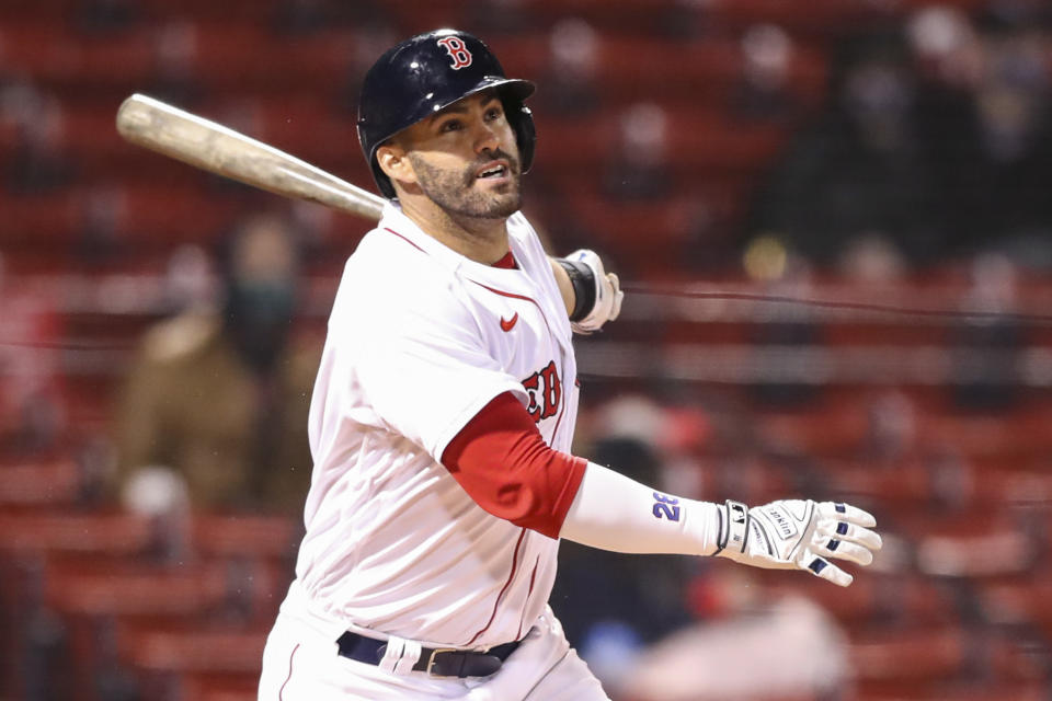 BOSTON, MA - APRIL 05:  J.D. Martinez #28 of the Boston Red Sox hits a three-run home run in the eighth inning of a game against the Tampa Bay Rays at Fenway Park on April 5, 2021 in Boston, Massachusetts.  (Photo by Adam Glanzman/Getty Images)