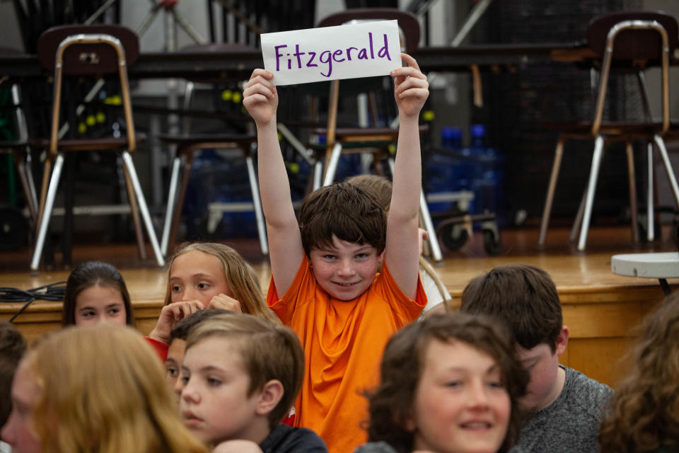 Trystan Sheridan, a student at Vinal Elementary School holds during the "Vinal Book Bee" at Vinal Elementary School in Norwell on Friday, May 27, 2022.