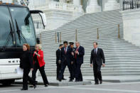 U.S. Senator Lindsey Graham (R-SC), (2nd R), with others gets into a Senate caravan from Capitol Hill to attend a North Korea briefing at the White House, in Washington, U.S., April 26, 2017. REUTERS/Yuri Gripas