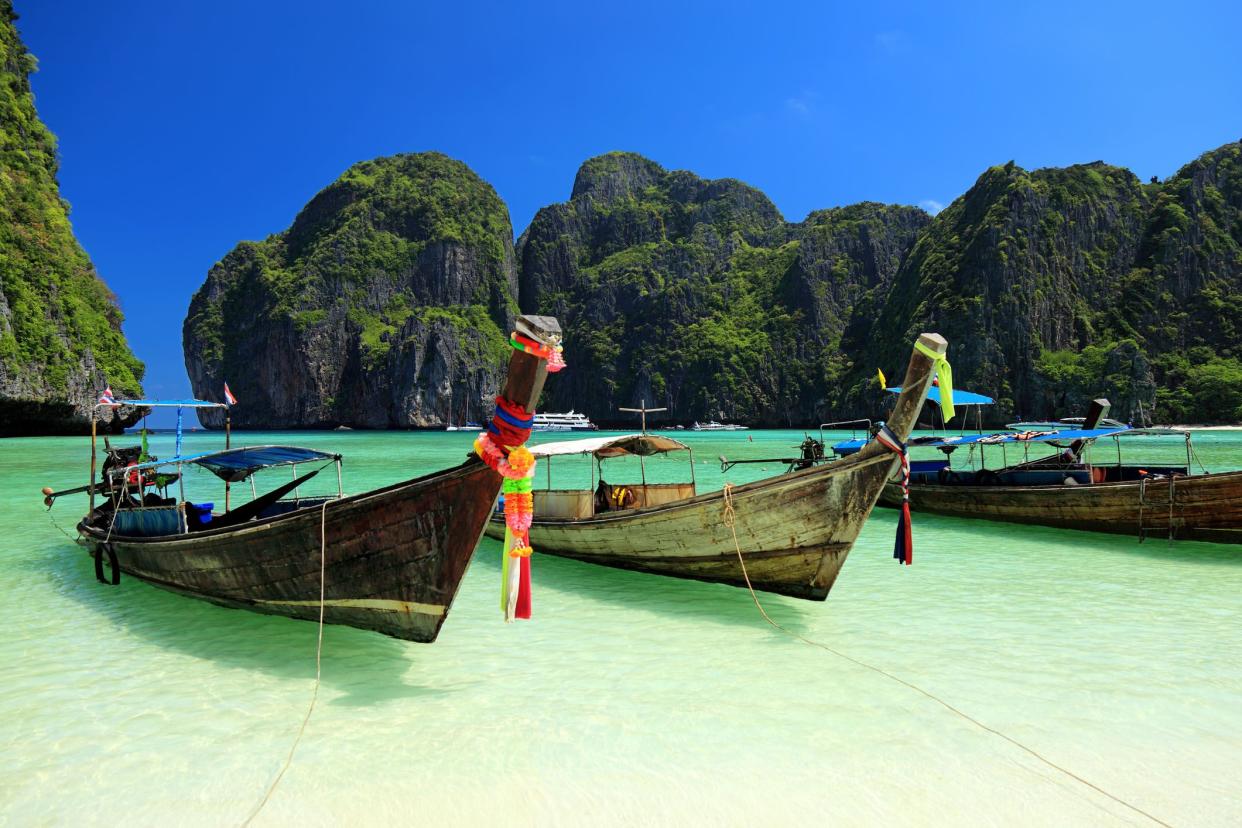 boats in maya bay in phuket