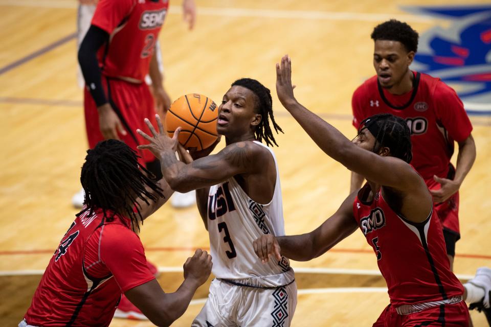 Southern Indiana’s Tyler Henry (3) goes up for a shot as the University of Southern Indiana Screaming Eagles play the Southeast Missouri State Redhawks at Screaming Eagles Arena in Evansville, Ind., Thursday, Dec. 29, 2022. 