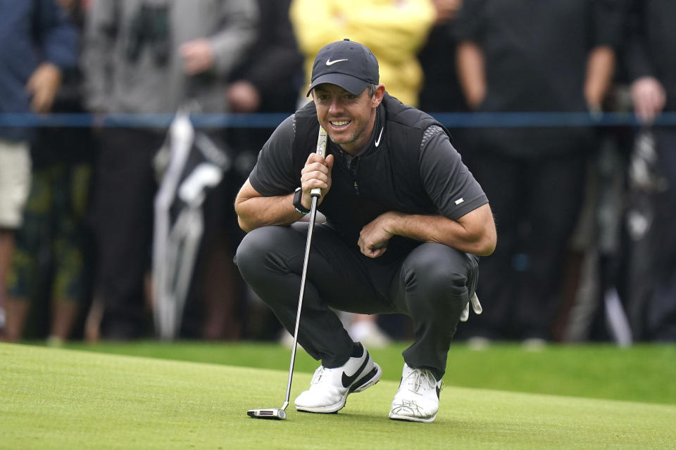 Northern Ireland's Rory McIlroy reacts on the 2nd green, during day one of the PGA Championship at Wentworth Golf Club, Virginia Water, Surrey, England, Thursday, Sept. 8, 2022. (Adam Davy/PA via AP)