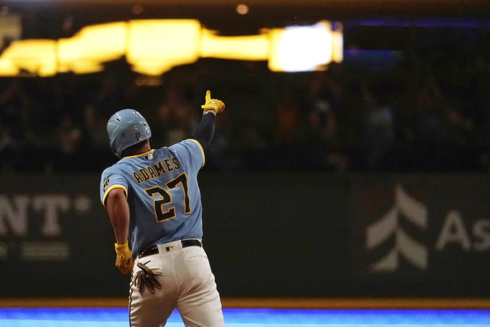 Milwaukee Brewers' Willy Adames gestures after hitting a three-run home run during the third inning of a baseball game against the New York Yankees Saturday, Sept. 17, 2022, in Milwaukee. This broke the franchise record for most home runs in a single season by a shortstop. (AP Photo/Aaron Gash)