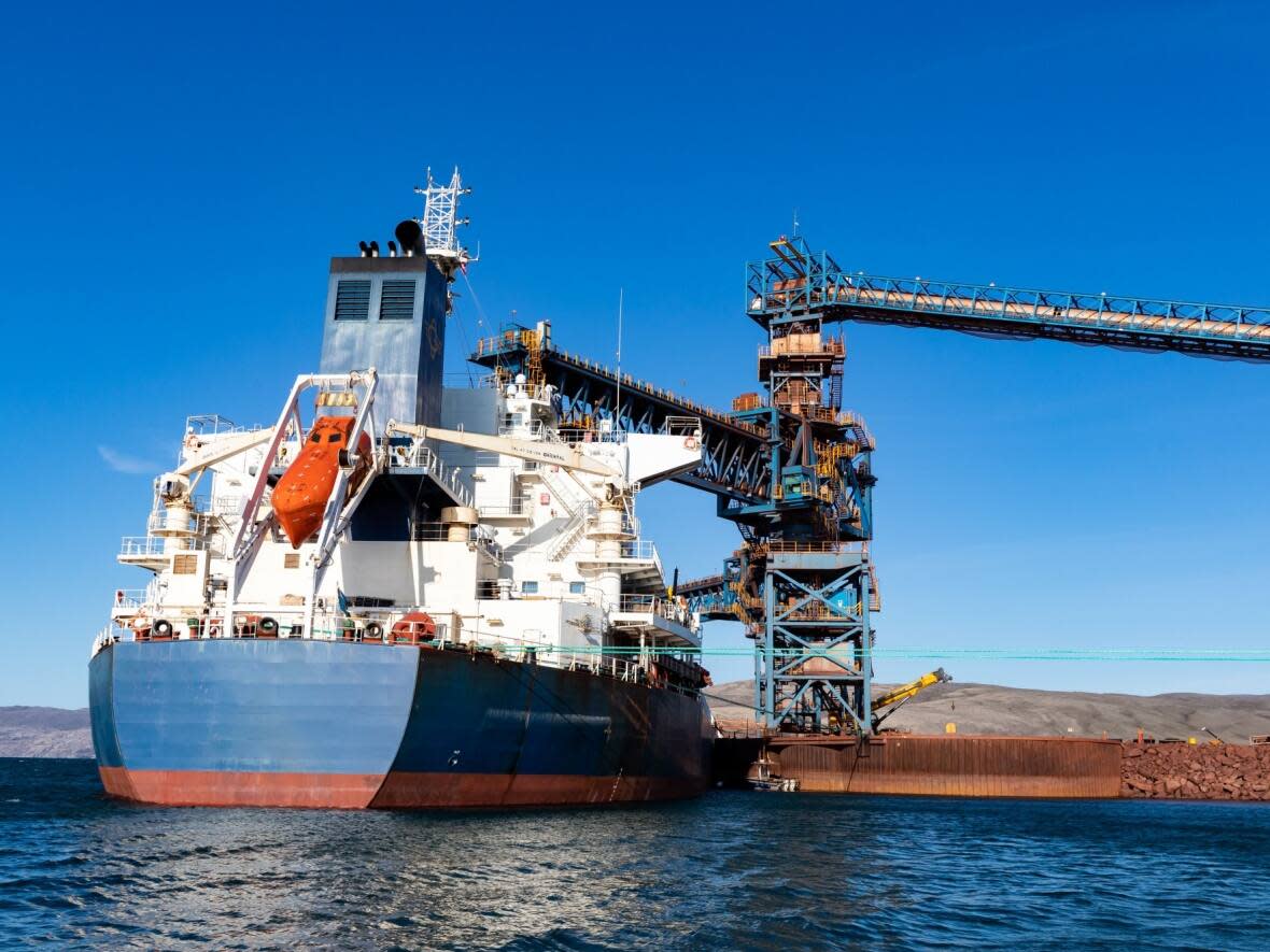 A ship is loaded at Baffinland's Milne Inlet port on North Baffin Island.  (Baffinland Iron Mines Corp.  - image credit)