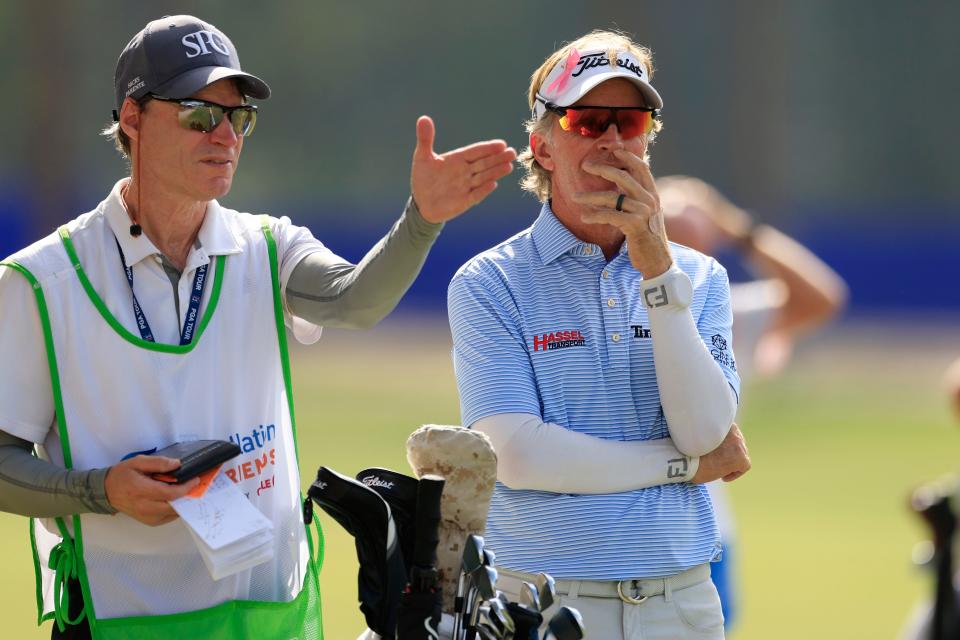 Brett Quigley (right) and caddie Nick Hunter talk strategy during the final round of the 2023 Furyk & Friends, at the Timuquana Country Club. Quigley will defend his championship Oct. 4-6.