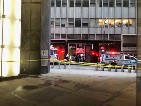 NYPD vehicles are seen in a restricted area after an incident at the Fulton St. subway station in Manhattan, New York