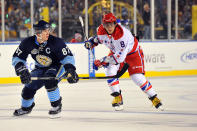 <p>Sidney Crosby #87 of the Pittsburgh Penguins skates against Alex Ovechkin #8 of the Washington Capitals during the 2011 NHL Bridgestone Winter Classic at Heinz Field on January 1, 2011 in Pittsburgh, Pennsylvania. (Photo by Brian Babineau/NHLI via Getty Images) </p>