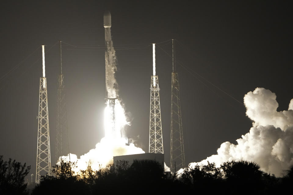 FILE - A SpaceX Falcon 9 rocket, with a payload including two lunar rovers from Japan and the United Arab Emirates, lifts off from Launch Complex 40 at the Cape Canaveral Space Force Station in Cape Canaveral, Fla., on Dec. 11, 2022. A Japanese company’s spacecraft apparently crashed while attempting to land on the moon Wednesday, April 26, 2023, losing contact moments before touchdown and sending flight controllers scrambling to figure out what happened. (AP Photo/John Raoux, File)