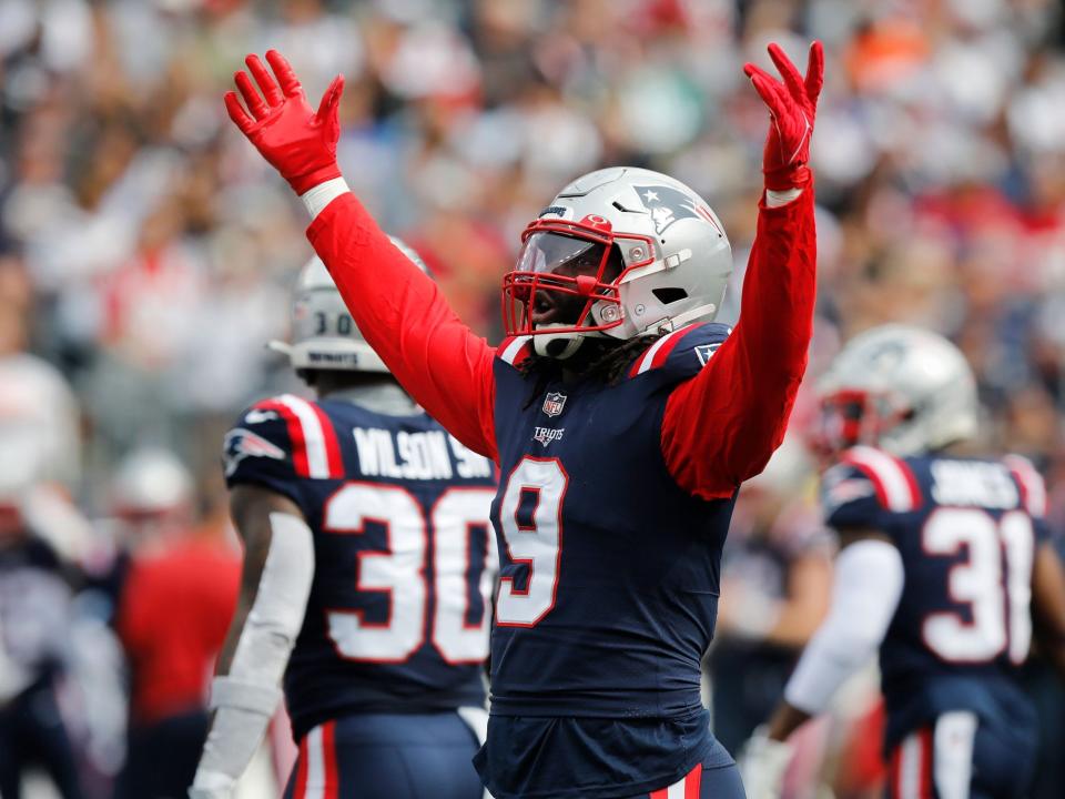 Matthew Judon pumps up the crowd during a game against the Baltimore Ravens.