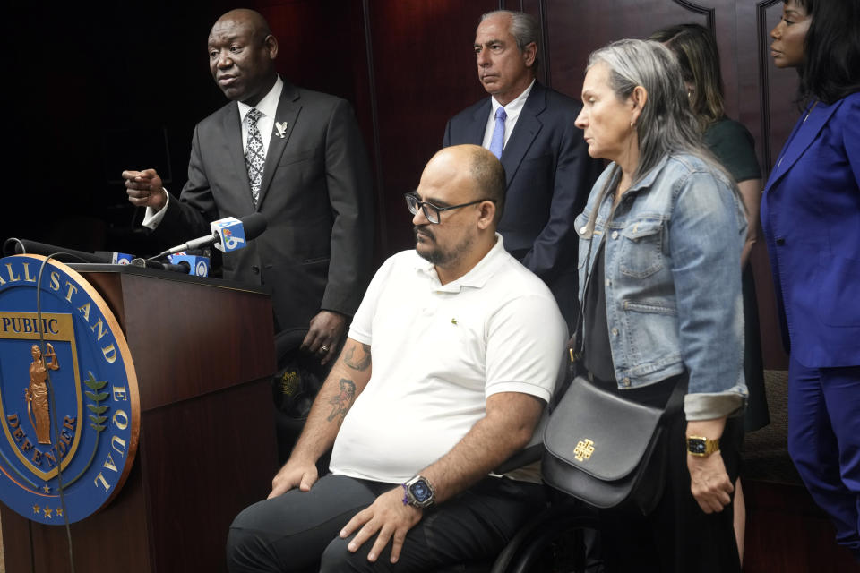 Attorney Ben Crump speaks at a news conference where he is representing Michael Ortiz in a lawsuit against a police officer, Wednesday, March 1, 2023, in Fort Lauderdale, Fla. Ortiz is suing after being paralyzed by a Hollywood, Fla., police officer who mistook his handgun for a taser and shot him in the back. (AP Photo/Marta Lavandier)