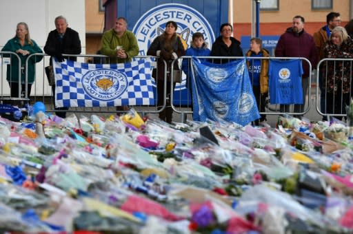 Fans fearing the worst had laid out flowers, football scarves and Buddhist prayers outside Leicester City's King Power stadium after the accident