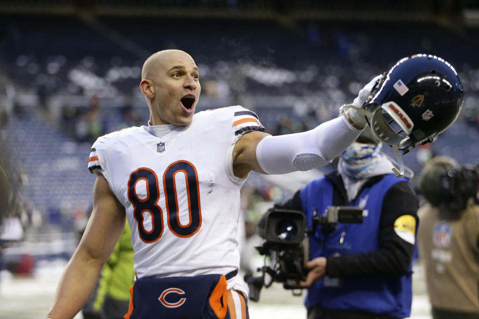 Chicago Bears' Jimmy Graham motions to fans as he heads off the field after his team defeated the Seattle Seahawks in an NFL football game, Sunday, Dec. 26, 2021, in Seattle. (AP Photo/Lindsey Wasson)