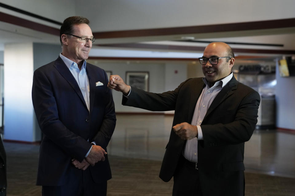 San Francisco Giants new manager Bob Melvin listens to President of Baseball Operations Farhan Zaidi, right, before the start of an introductory baseball news conference at Oracle Park in San Francisco, Wednesday, Oct. 25, 2023. (AP Photo/Eric Risberg)