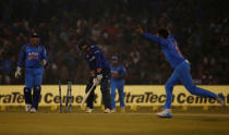 Cricket - India v England - Second One Day International - Barabati Stadium, Cuttack, India - 19/01/17 - India's Ravindra Jadeja (R) celebrates after dismissing England's Jason Roy (C). REUTERS/Adnan Abidi