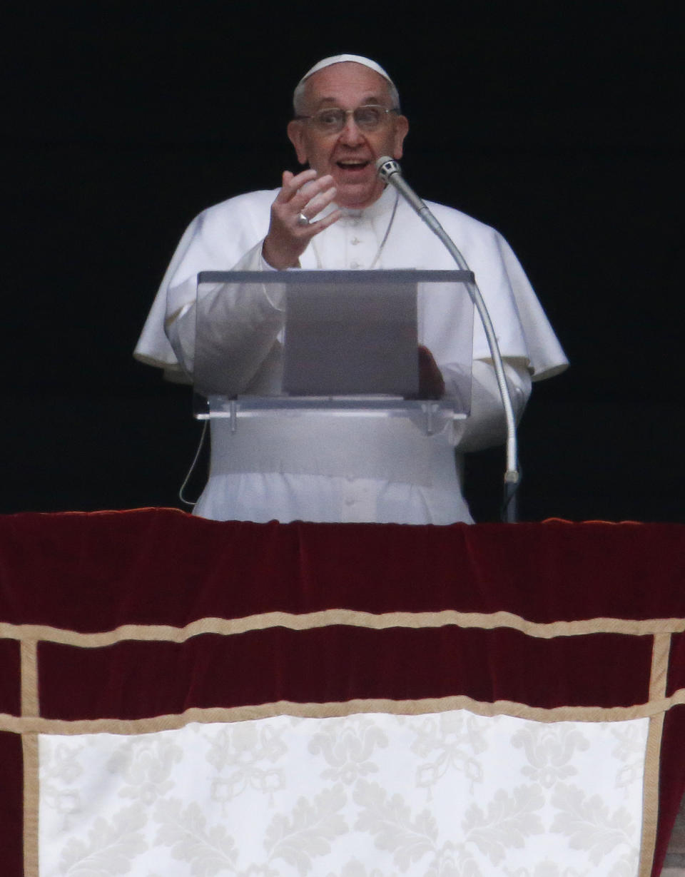 Pope Francis delivers his Angelus prayer from the window of his studio overlooking St. Peter's Square, at the Vatican, Sunday, March 17, 2013. (AP Photo/Michael Sohn)