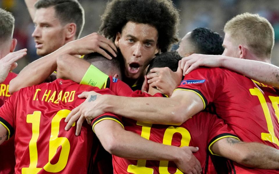 Belgium's Thorgan Hazard celebrates scoring their first goal with teammates -  Pool via REUTERS/Thanassis Stavrakis