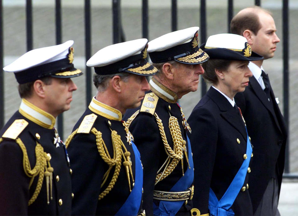 FILE - In this Tuesday, April 9, 2002 file photo, members of the British royal family follow the coffin of the Queen Mother en route to her funeral in Westminster Abbey in London. From left: Prince Andrew, Prince Charles, Prince Philip, Princess Anne and Prince Edward. Buckingham Palace officials say Prince Philip, the husband of Queen Elizabeth II, has died, it was announced on Friday, April 9, 2021. He was 99. Philip spent a month in hospital earlier this year before being released on March 16 to return to Windsor Castle. Philip, also known as the Duke of Edinburgh, married Elizabeth in 1947 and was the longest-serving consort in British history. (AP Photo/Santiago Lyon, File)