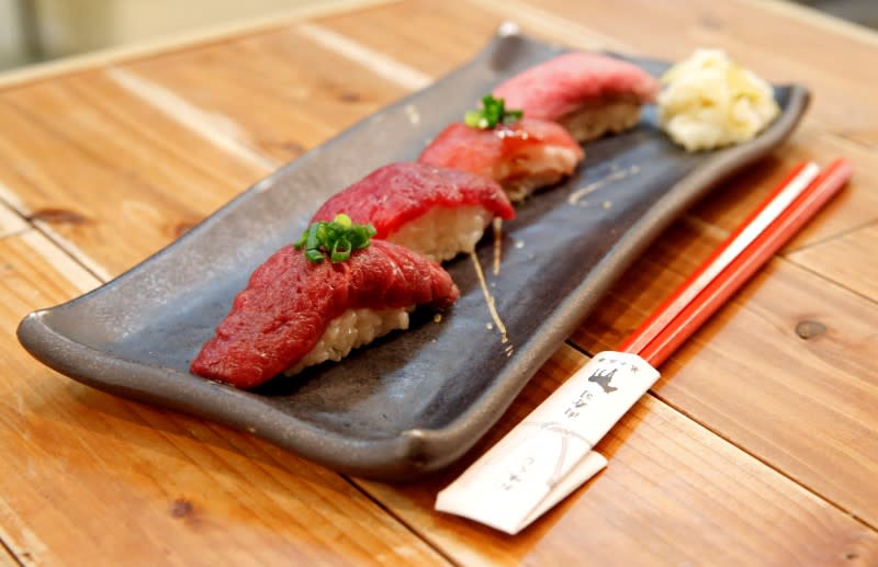 FILE PHOTO: A meat sushi plate is seen at Nikuzushi restaurant in Tokyo, Japan