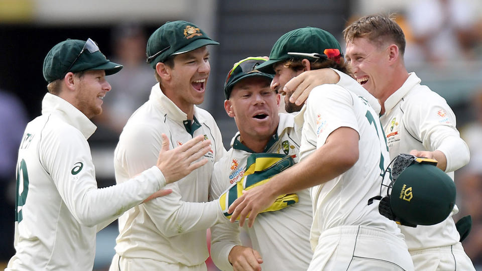 Tim Paine celebrates with his side after a big first Test win over Pakistan. Pic: Getty