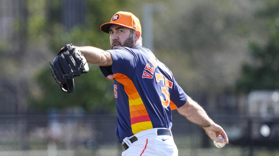 FILE - Houston Astros pitcher Justin Verlander (35) warms up as he prepared to throw during spring training baseball workouts, Thursday, Feb. 15, 2024, in West Palm Beach, Fla. Houston Astros ace Justin Verlander will open the season on the injured list after dealing with right shoulder inflammation during the offseason, which could jeopardize his conditional $35 million option for 2025. Astros manager Joe Espada said Tuesday, March 5, the 41-year-old Verlander hasn't suffered any setbacks but needs more time to become game ready. (Karen Warren/Houston Chronicle via AP, File)