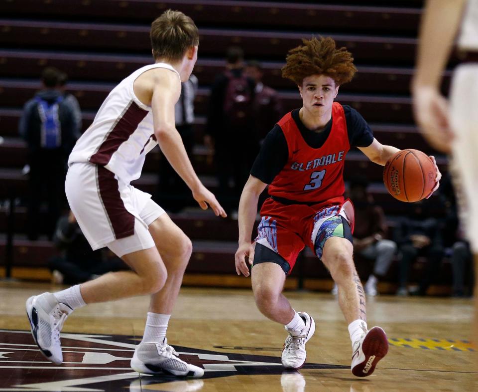 Glendale Falcons' Amare Witham brings the ball up court against the Strafford Indians in the second round of the Blue Division during the Blue and Gold Tournament at Great Southern Bank Arena on December 27th, 2023.