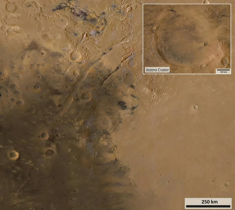 An overhead view of a sandy crater.