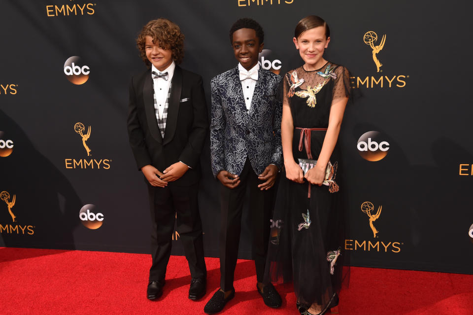 LOS ANGELES, CA - SEPTEMBER 18:  (L-R) Actors Gaten Matarazzo, Caleb McLaughlin, and Millie Bobby Brown attend the 68th Annual Primetime Emmy Awards at Microsoft Theater on September 18, 2016 in Los Angeles, California.  (Photo by Jeff Kravitz/FilmMagic)