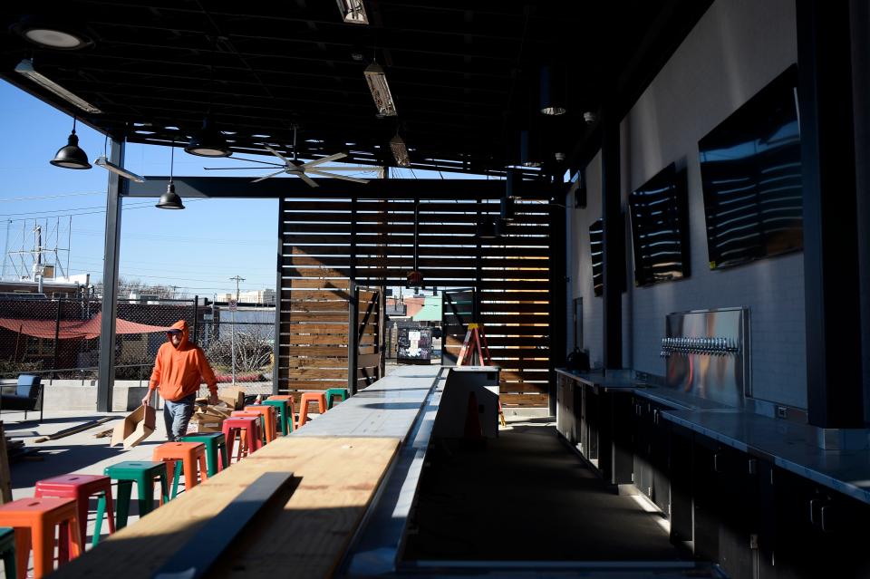 The outdoor bar at Yee-Haw Brewing Co., located at the former Elkmont Exchange Brewery, will have a variety of beer on tap, along with between three and four draft cocktails. The turfed outdoor area is roughly 8,000 square feet and can accommodate 700 people for everyday drinks or for ticketed concerts expected to happen three times each month.