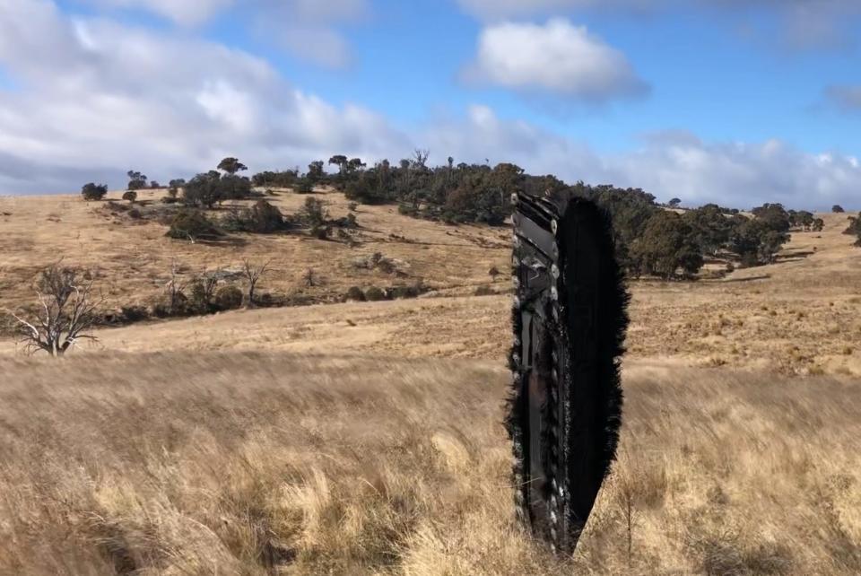 A piece of space junk is shown on a field in Australia in New South Wales, Australia.