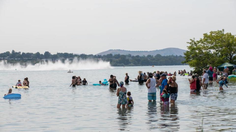 Spectators watch from the water during the 2022 Tri-Cities Water Follies.