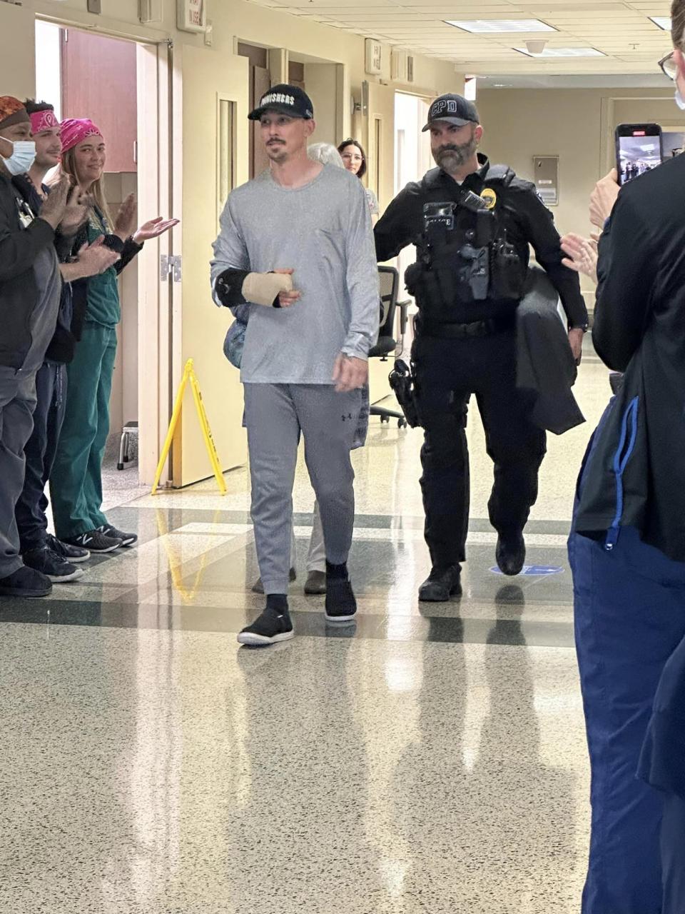 Dozens of officers and state troopers from across several cities in Montgomery and Greene counties gathered outside Miami Valley Hospital Tuesday as Officer Cody Cecil was released from Miami Valley Hospital five days after he was shot while serving a warrant in Clayton.