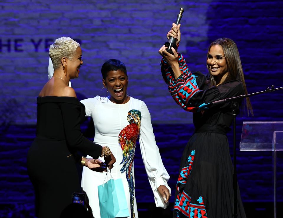 Stella Jean, right, accepts designer of the year from HFR's Brandice Daniel and Tamron Hall during the Harlem's Fashion Row Fashion Show and Style Awards at the Apollo Theater on Sept. 5, 2023, in New York City.