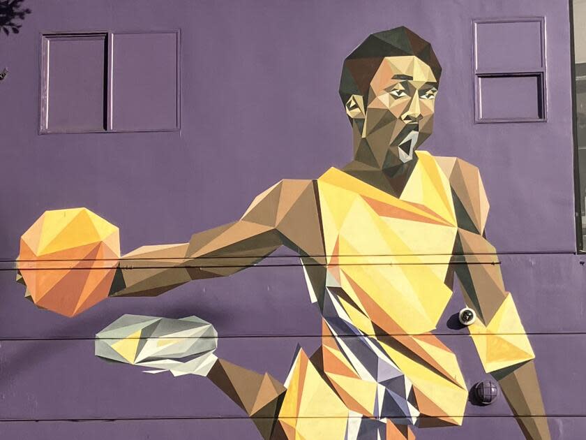 A mural outside Shoe Palace on Melrose Ave. pays tribute to Kobe Bryant.